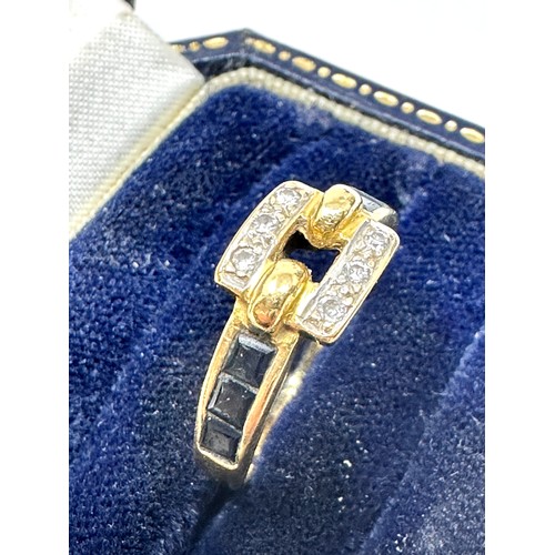 236 - 18ct gold vintage diamond and sapphire set buckle ring (3.1g)