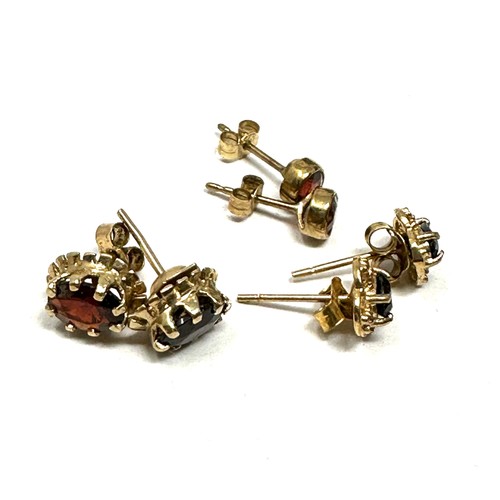 280 - 3 x 9ct gold garnet and sapphire set stud earrings (3.1g)