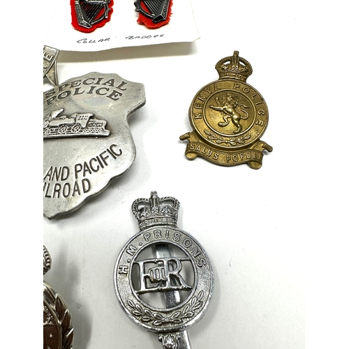 377 - 10 police & prison service badges