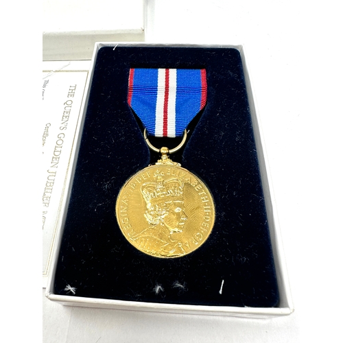 378 - Boxed ER.11 Queens golden jubilee medal & certificate