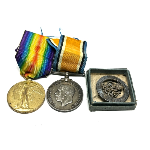 387 - ww1 medal pair with boxed silver war badge to 50057 pte g.m.hutchinson lancs fusiliers