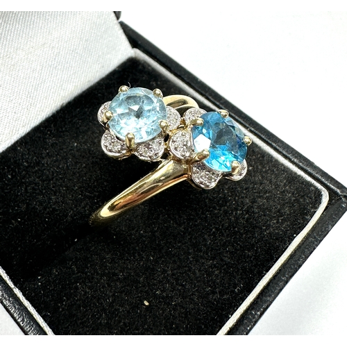 67 - 9ct gold topaz aquamarine & diamond ring