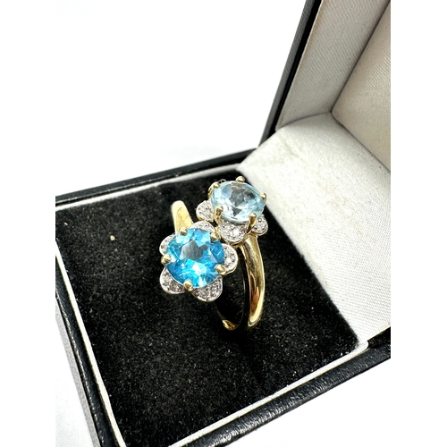 67 - 9ct gold topaz aquamarine & diamond ring