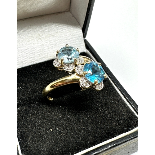 67 - 9ct gold topaz aquamarine & diamond ring