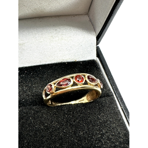 77 - 9ct gold garnet ring