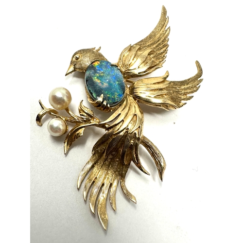 78 - 9ct gold opal doublet & pearl bird of paradise brooch measures approx 6cm by 5cm weight 9.4g