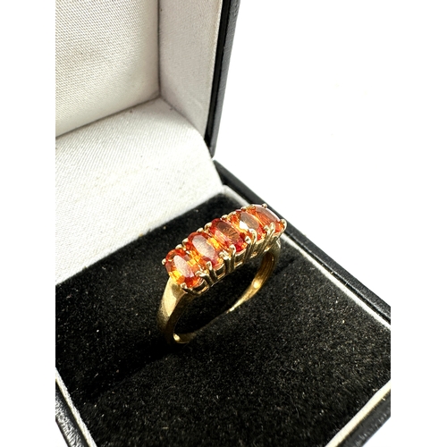 101 - Certificated 9ct gold Orange sapphire ring C.O.A