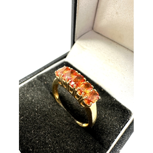 101 - Certificated 9ct gold Orange sapphire ring C.O.A