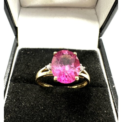 102 - 9ct gold pink topaz & diamond ring