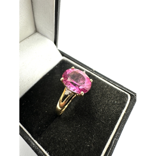 102 - 9ct gold pink topaz & diamond ring