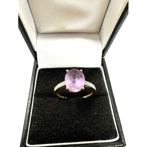 110 - 9ct gold amethyst & diamond ring