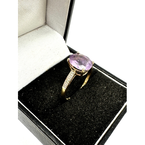 110 - 9ct gold amethyst & diamond ring