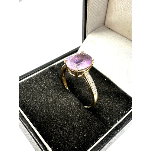 110 - 9ct gold amethyst & diamond ring