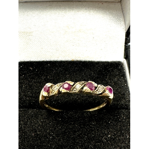 115 - 9ct gold ruby & diamond ring