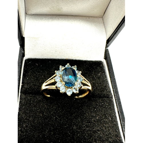 119 - 9ct gold blue topaz ring