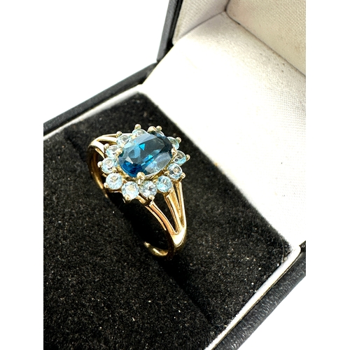 119 - 9ct gold blue topaz ring