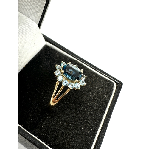 119 - 9ct gold blue topaz ring