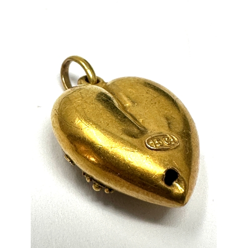 121 - Victorian 15ct gold puffy heart pendant