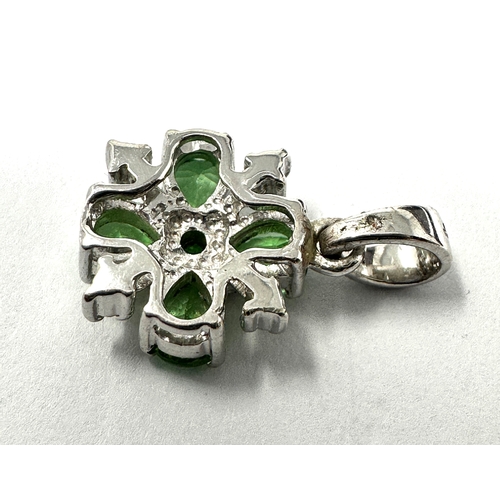 127 - 9ct white gold green gemstone & diamond pendant