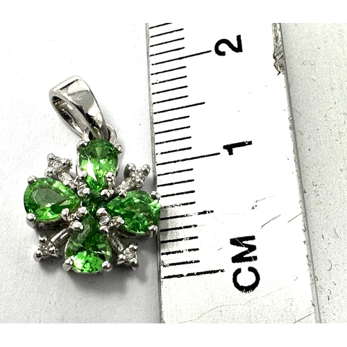 127 - 9ct white gold green gemstone & diamond pendant