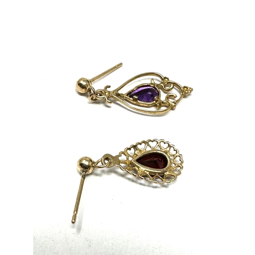 137 - 2 odd 9ct gold earring amethyst & garnet 1.5g