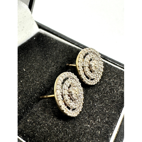 142 - 9ct gold diamond earrings