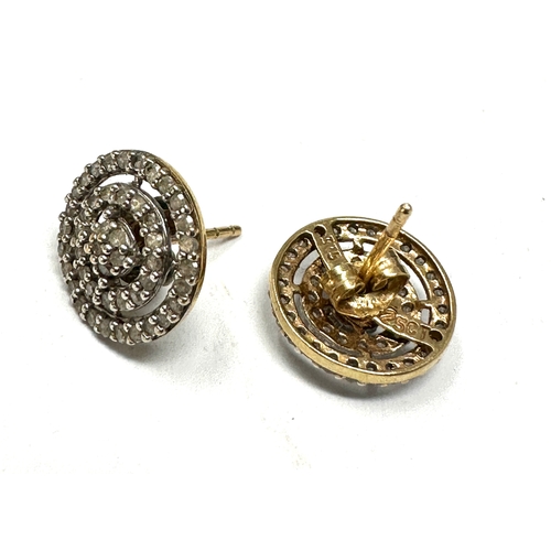 142 - 9ct gold diamond earrings