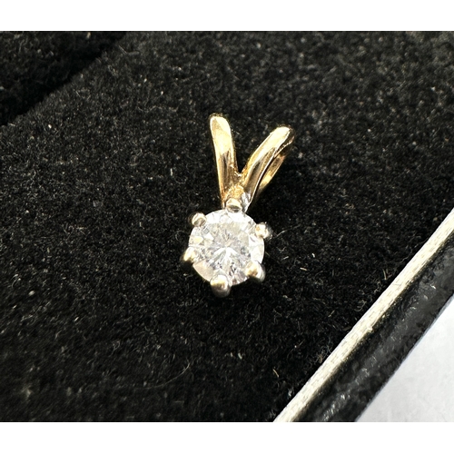 148 - 9ct gold diamond pendant