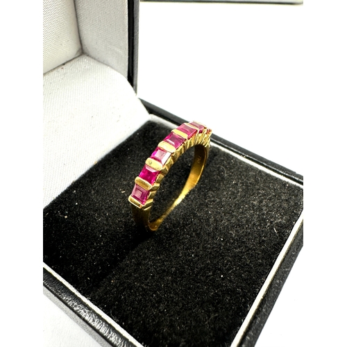 151 - 18ct gold ruby ring set with 7 rubies weight 3.2