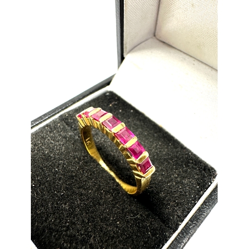 151 - 18ct gold ruby ring set with 7 rubies weight 3.2