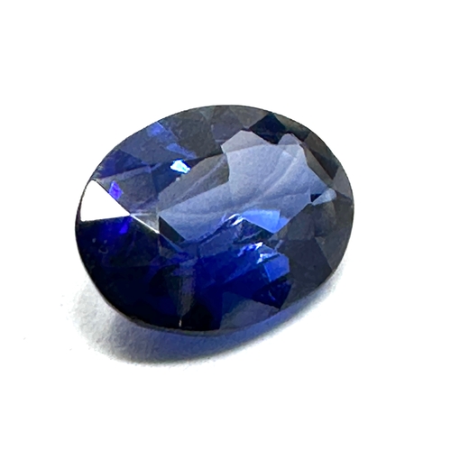 155 - loose blue sapphire measures approx 9.5mm by 7mm