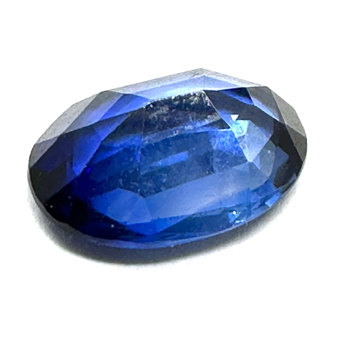 155 - loose blue sapphire measures approx 9.5mm by 7mm