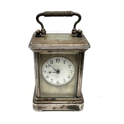 463 - Small Vintage silver plated carriage clock the clock is ticking measures approx height 8cm by 6cm wi... 