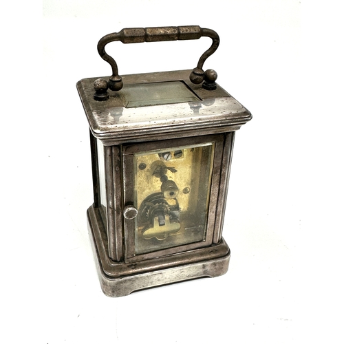 463 - Small Vintage silver plated carriage clock the clock is ticking measures approx height 8cm by 6cm wi... 