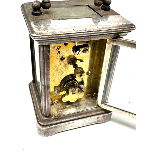 463 - Small Vintage silver plated carriage clock the clock is ticking measures approx height 8cm by 6cm wi... 