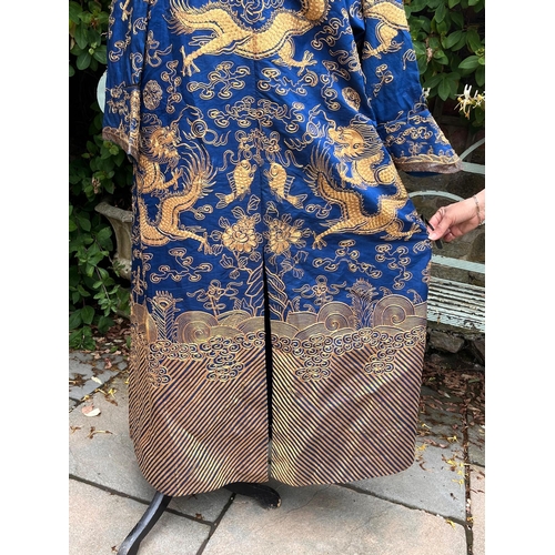 400 - Fine Antique Chinese blue silk robe with gold thread dragon decoration length approx 1.4 metres