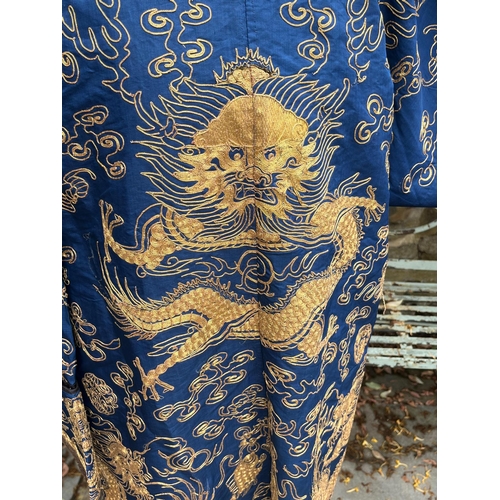 400 - Fine Antique Chinese blue silk robe with gold thread dragon decoration length approx 1.4 metres