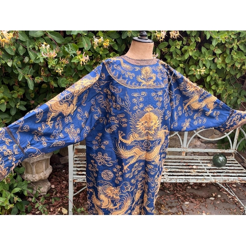 400 - Fine Antique Chinese blue silk robe with gold thread dragon decoration length approx 1.4 metres