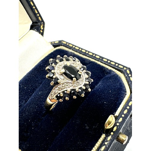 282 - 9ct gold diamond and sapphire ring (3g)