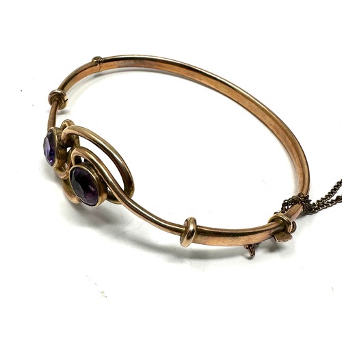 285 - 9ct rose gold victorian amethyst bangle (6.8g)