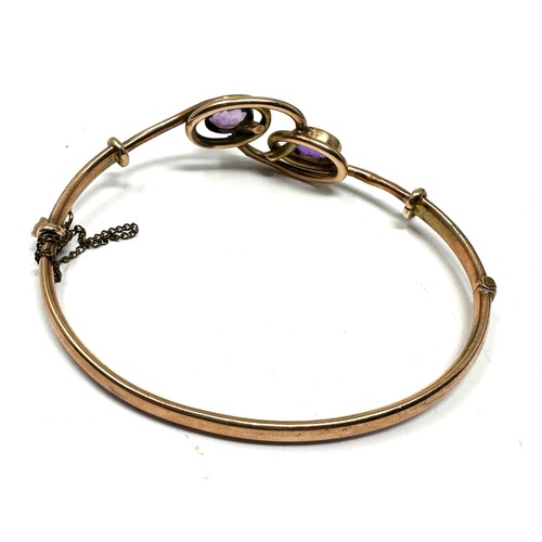 285 - 9ct rose gold victorian amethyst bangle (6.8g)