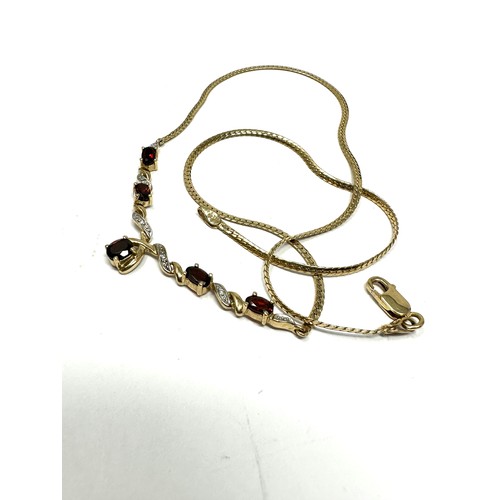 265 - 9ct gold diamond and garnet chain necklace (6g)