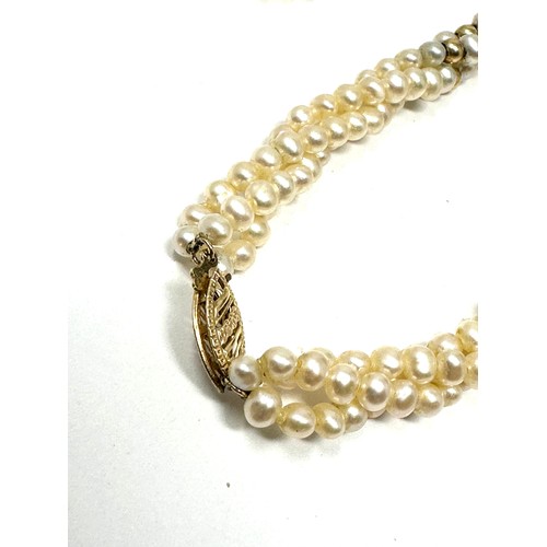 149 - 14ct gold clasp freshwater pearl bead necklace and gold spacers measures approx 44cm long weight 21g