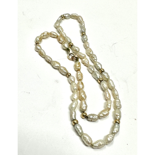 150 - 9ct gold clasp freshwater pearl bead necklace and gold spacers measures approx 37cm long weight 7g