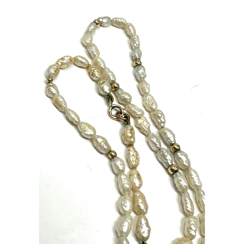 150 - 9ct gold clasp freshwater pearl bead necklace and gold spacers measures approx 37cm long weight 7g