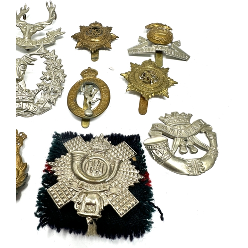 10 - selection of military cap badges