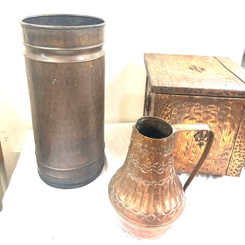 130 - 3 Pieces of copper ware includes coal box, umbrella stand an a persian jug