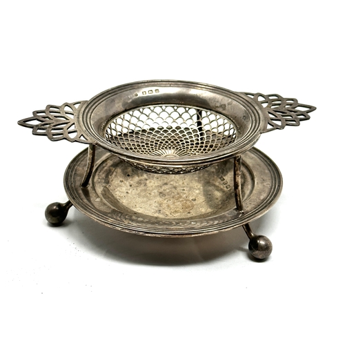 148 - Vintage silver tea strainer on stand Birmingham silver hallmarks