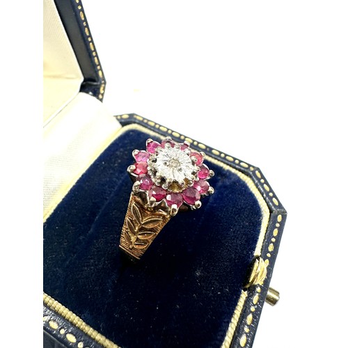 180 - 9ct gold diamond & ruby ring (5g)