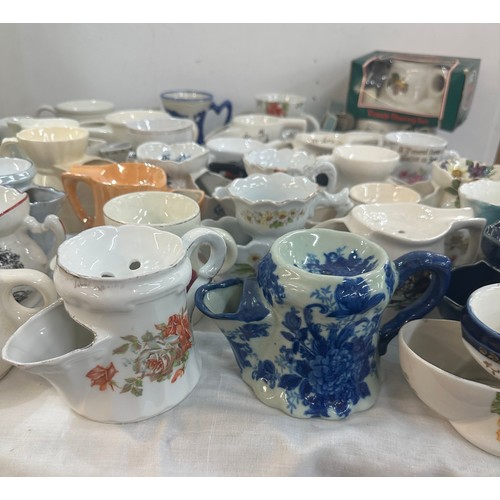 128 - A large collection of porcelain shaving mugs various makers and designs